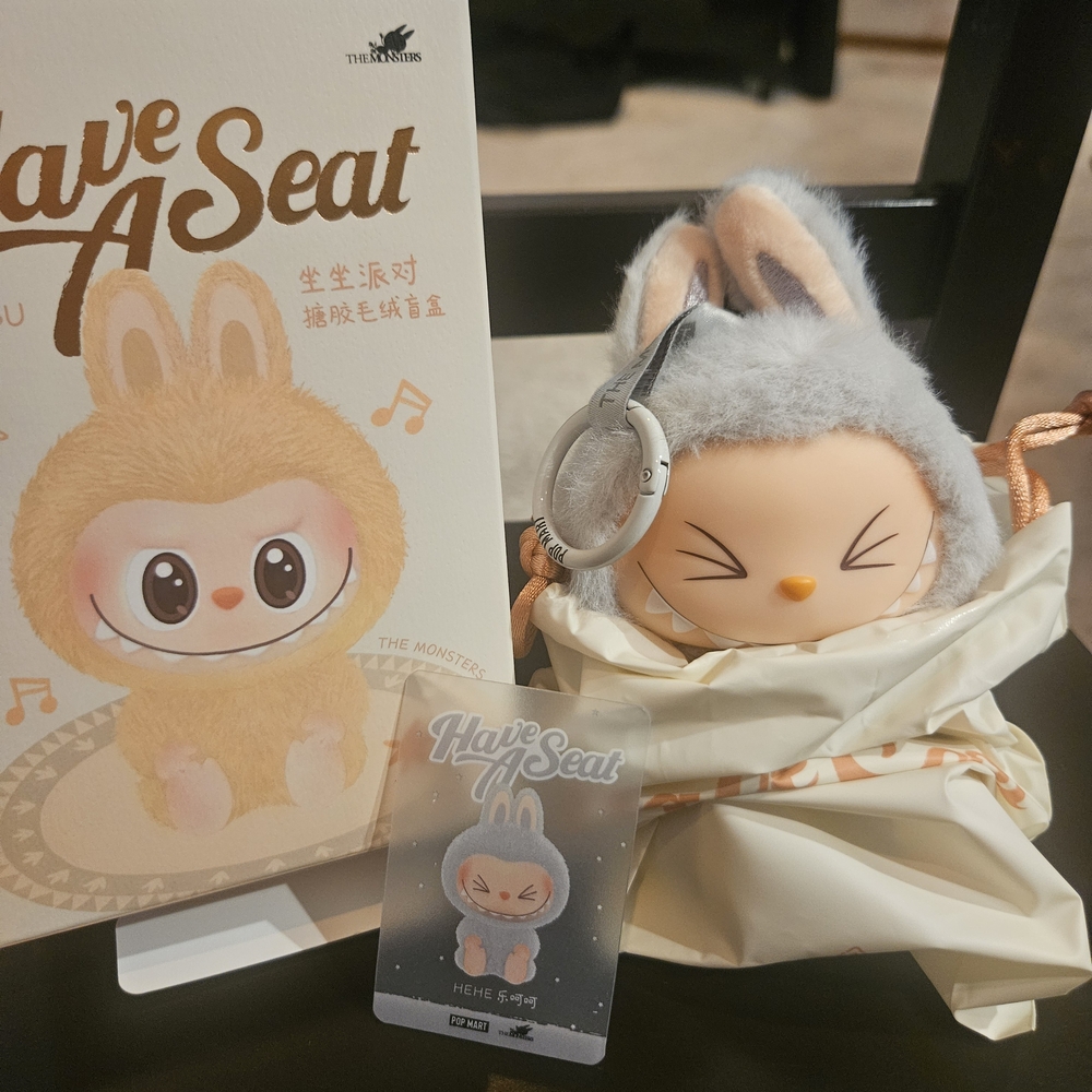 SOLD  Labubu Have A Seat "HEHE" Vinyl Figure